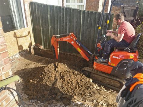 digging footer with mini excavator|footing digger.